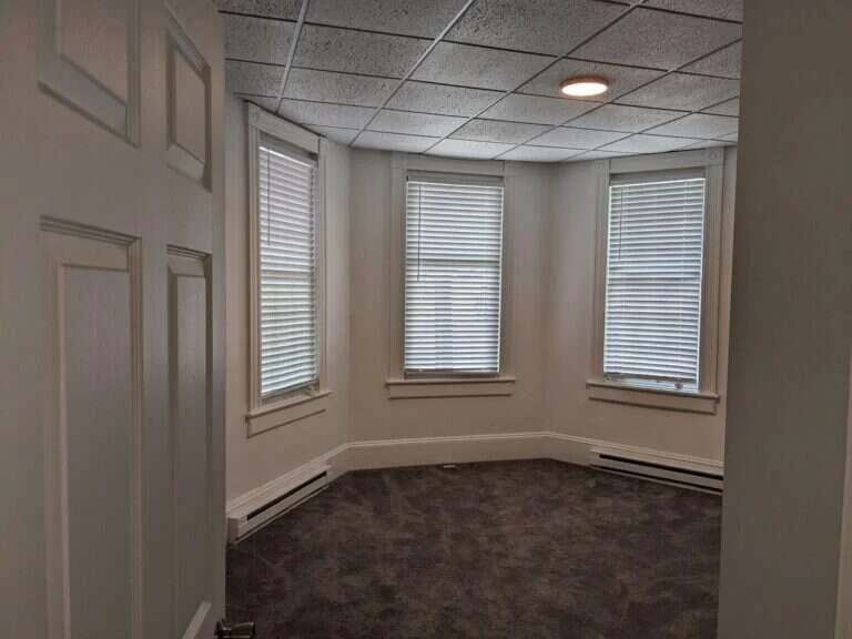 Living room with bay windows, 225 Baltimore St Apt 1, Cumberland MD